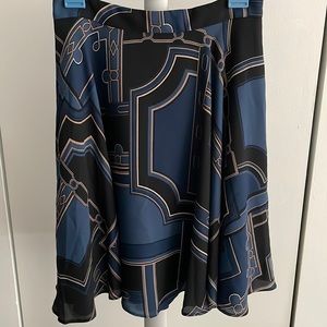 Ann Taylor blue and black abstract flutter skirt. Size 00P